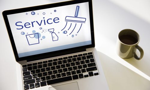 Illustration of home cleaning service on laptop